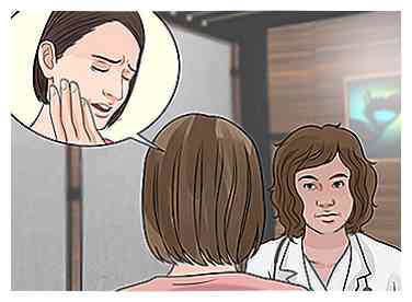 Cómo sanar las encías después de una extracción de dientes (con imágenes)