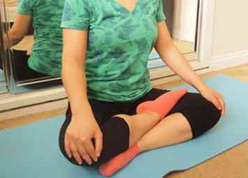 Cómo hacer la postura del ángulo límite reclinado en Yoga 12 pasos