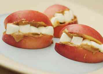 Hvordan laver Apple og Marshmallow Smile Snacks 6 trin