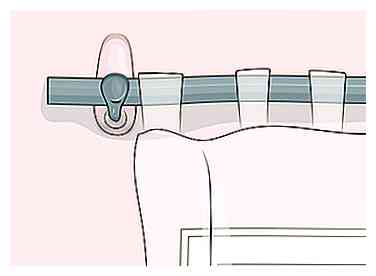 Cómo colgar cortinas con ganchos de comando (con imágenes)